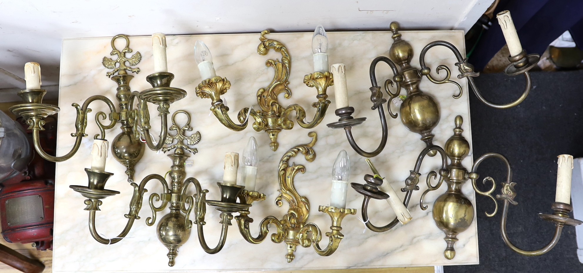 A pair of French ormolu two branch sconces, 27cms high